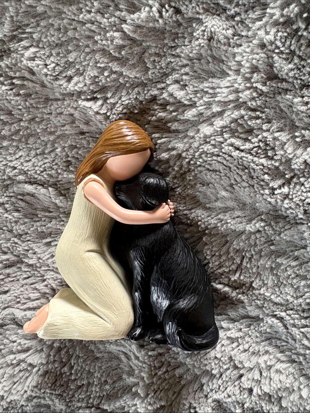Source Unknown Cream-Clad Woman Figurine Hugging Black Dog